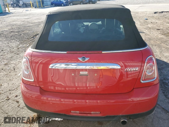 2013 MINI Convertible with VIN WMWZN3C58DT265980, listed as a Copart auction lot 77157154 with 88,975 mi miles and Salvage title. Bid and sale history available at DreamBid. Image 6.