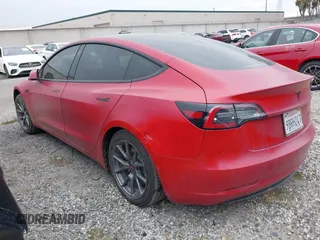 2022 Tesla Model 3 Long Range with VIN 5YJ3E1EB3NF273540, listed as a IAAI auction lot 41978069 with 27,247 mi miles and . Bid and sale history available at DreamBid. Image 3.