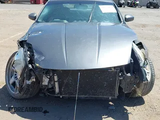 2004 Nissan 350Z Touring z VIN JN1AZ34E94M155097, wystawiony jako IAAI lot #42273474 z przebiegiem Nie podano mil oraz . Historia ofert i sprzedaży dostępna na DreamBid. Obrazek 6.