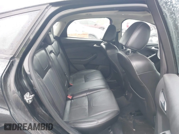 2014 Ford Focus SE z VIN 1FADP3K20EL386198, wystawiony jako IAAI lot #42157909 z przebiegiem 125 097 mil mil oraz . Historia ofert i sprzedaży dostępna na DreamBid. Obrazek 8.