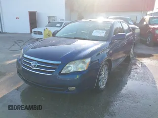 2007 Toyota Avalon XL with VIN 4T1BK36B57U241449, listed as a IAAI auction lot 42035298 with 199,662 mi miles. Bid and sale history available at carsss.com. Image 2.
