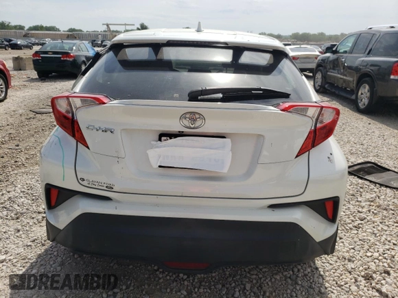 2018 Toyota C-HR XLE with VIN NMTKHMBXXJR041607, listed as a Copart auction lot 60540654 with 84,228 mi miles and Salvage Title. Bid and sale history available at DreamBid. Image 6.