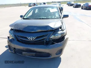2012 Toyota Corolla L with VIN 2T1BU4EE9CC831743, listed as a IAAI auction lot 41870966 with 166,548 mi miles. Bid and sale history available at carsss.com. Image 6.
