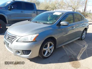 2014 Nissan Sentra SR z VIN 3N1AB7AP1EY309172, wystawiony jako IAAI lot #41577550 z przebiegiem 142 610 mil mil oraz . Historia ofert i sprzedaży dostępna na DreamBid. Obrazek 2.