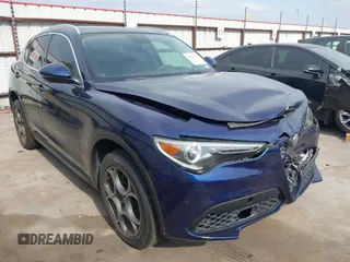 2019 Alfa Romeo Stelvio z VIN ZASPAKAN0K7C44623, wystawiony jako IAAI lot #42062414 z przebiegiem 68 722 mil mil oraz . Historia ofert i sprzedaży dostępna na DreamBid. Obrazek 1.