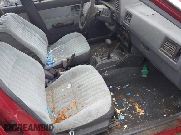 1990 Nissan Sentra z VIN JN1GB21B5LU503902, wystawiony jako IAAI lot #42358723 z przebiegiem 172 484 mil mil oraz . Historia ofert i sprzedaży dostępna na DreamBid. Obrazek 5.