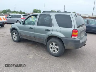 2005 Ford Escape XLT with VIN 1FMYU93165KA02357, listed as a IAAI auction lot 42858975 with 119,905 mi miles and . Bid and sale history available at DreamBid. Image 3.