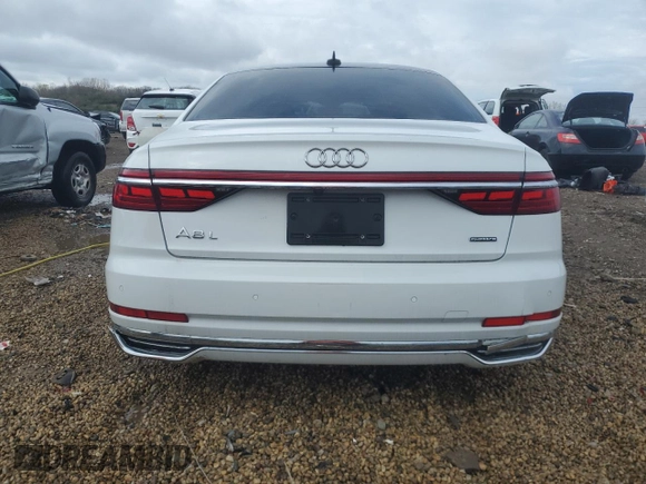2019 Audi A8 z VIN WAU8DAF87KN018640, wystawiony jako Copart lot #54318975 z przebiegiem Nie podano mil oraz Szkoda całkowita • Salvage title. Historia ofert i sprzedaży dostępna na DreamBid. Obrazek 6.