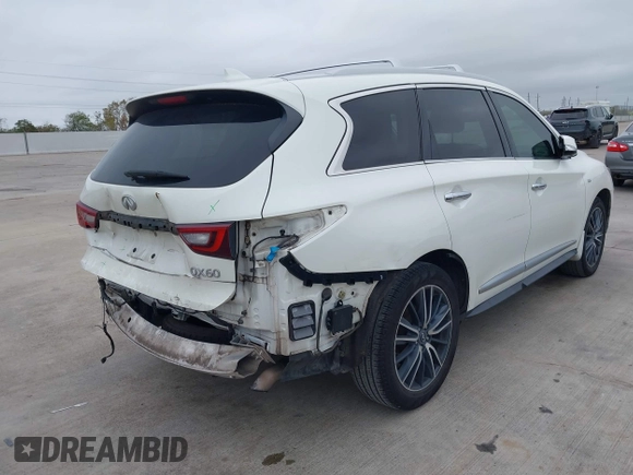 2019 Infiniti QX60 LUXE with VIN 5N1DL0MN2KC551218, listed as a IAAI auction lot 41101804 with 111,621 mi miles. Bid and sale history available at carsss.com. Image 4.