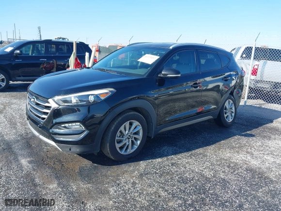2016 Hyundai Tucson Limited with VIN KM8J33A27GU237225, listed as a IAAI auction lot 41223497 with 158,986 mi miles. Bid and sale history available at carsss.com. Image 18.
