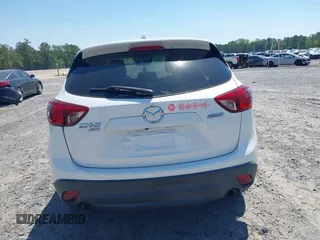 2013 Mazda CX-5 Touring with VIN JM3KE4CE8D0156843, listed as a IAAI auction lot 42018321 with 143,396 mi miles. Bid and sale history available at carsss.com. Image 16.