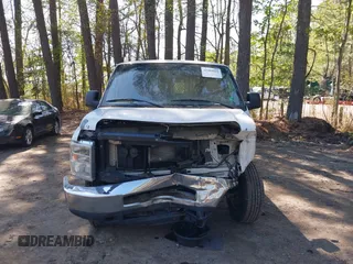 2013 Ford Econoline Cargo Commercial with VIN 1FTNE2EW7DDA15769, listed as a IAAI auction lot 41989021 with 179,557 mi miles and . Bid and sale history available at DreamBid. Image 13.