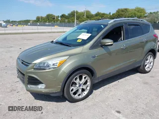 2013 Ford Escape Titanium with VIN 1FMCU0J94DUB06332, listed as a IAAI auction lot 41824742 with 92,633 mi miles. Bid and sale history available at carsss.com. Image 2.