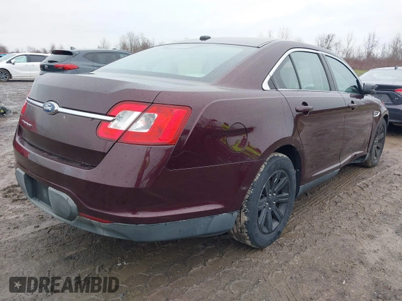 2011 Ford Taurus SE with VIN 1FAHP2DW7BG136988, listed as a IAAI auction lot 42002512 with 145,847 mi miles. Bid and sale history available at carsss.com. Image 4.