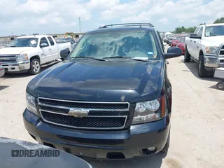 2011 Chevrolet Tahoe LT with VIN 1GNSCBE08BR391781, listed as a IAAI auction lot 42387512 with 169,257 mi miles and . Bid and sale history available at DreamBid. Image 12.