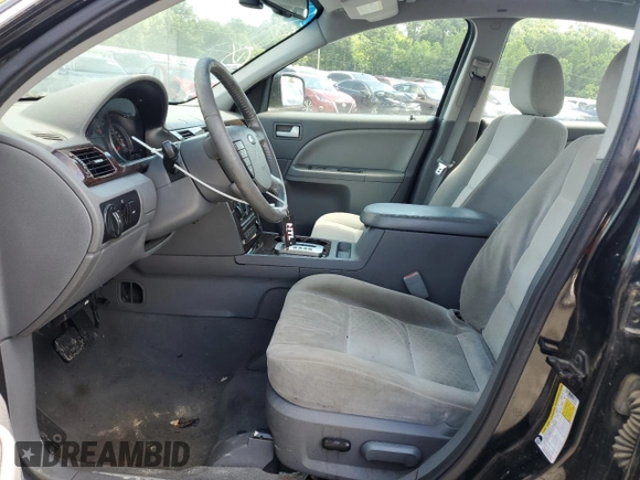 2007 Ford Five Hundred SEL z VIN 1FAHP24177G156766, wystawiony jako Copart lot #57332255 z przebiegiem Nie podano mil oraz Nie do naprawy. Historia ofert i sprzedaży dostępna na DreamBid. Obrazek 7.