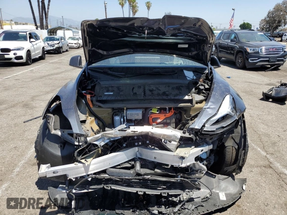 2024 Tesla Model Y с VIN 7SAYGDED5RF177307, выставлен на аукционе Copart как лот 57170315 с пробегом 14 726 миль миль и Списание • Salvage title. История ставок и продаж доступна на DreamBid. Изображение 5.