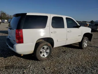 2013 GMC Yukon SLT with VIN 1GKS1CE0XDR178441, listed as a Copart auction lot 45245265 with 144,463 mi miles and Salvage Title. Bid and sale history available at carsss.com. Image 3.