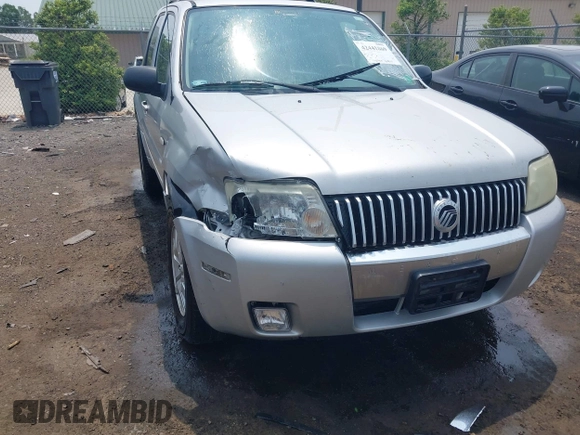 2005 Mercury Mariner Luxury z VIN 4M2CU57135DJ23718, wystawiony jako IAAI lot #42441869 z przebiegiem 179 378 mil mil oraz . Historia ofert i sprzedaży dostępna na DreamBid. Obrazek 6.
