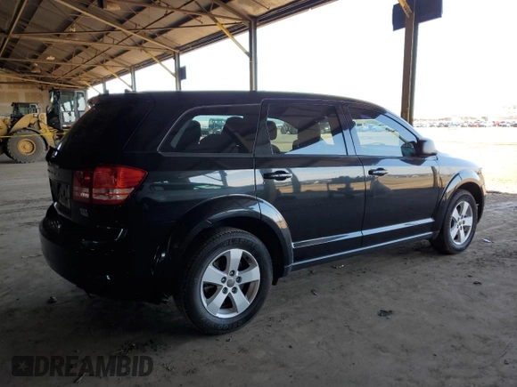 2013 Dodge Journey SE with VIN 3C4PDCAB4DT575943, listed as a Copart auction lot 48760385 with 127,081 mi miles and Salvage Title. Bid and sale history available at carsss.com. Image 3.