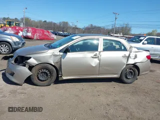 2009 Toyota Corolla with VIN 1NXBU40E09Z144942, listed as a IAAI auction lot 42051178 with 101,564 mi miles and . Bid and sale history available at DreamBid. Image 14.