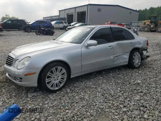 2007 Mercedes-Benz E 550 with VIN WDBUF90X97X214986, listed as a Copart auction lot 59349405 with 180,463 mi miles and Salvage title. Bid and sale history available at DreamBid. Image 1.
