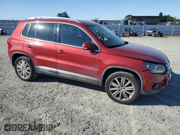 2013 Volkswagen Tiguan SE with VIN WVGBV7AX9DW012368, listed as a Copart auction lot 57244975 with 177,810 mi miles and Salvage title. Bid and sale history available at DreamBid. Image 4.