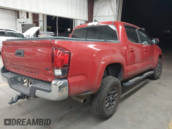 2018 Toyota Tacoma SR with VIN 3TMCZ5AN0JM166978, listed as a IAAI auction lot 41936143 with 129,674 mi miles. Bid and sale history available at carsss.com. Image 4.