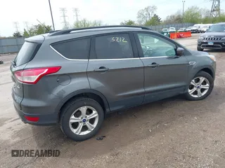 2016 Ford Escape SE with VIN 1FMCU9GX0GUC21749, listed as a IAAI auction lot 42115212 with 149,027 mi miles. Bid and sale history available at carsss.com. Image 4.