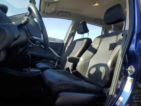 2012 Honda Fit Sport with VIN JHMGE8H58CC032971, listed as a Copart auction lot 51586445 with 125,128 mi miles and Salvage Title. Bid and sale history available at carsss.com. Image 7.