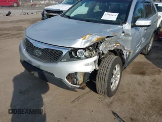 2012 Kia Sorento LX with VIN 5XYKTDA68CG215084, listed as a IAAI auction lot 41783121 with 213,223 mi miles. Bid and sale history available at carsss.com. Image 6.