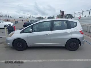 2013 Honda Fit with VIN JHMGE8H38DC002109, listed as a IAAI auction lot 42067257 with 305,739 mi miles. Bid and sale history available at carsss.com. Image 14.