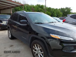 2014 Jeep Cherokee Latitude with VIN 1C4PJMCS5EW294743, listed as a IAAI auction lot 42098992 with 185,814 mi miles. Bid and sale history available at carsss.com. Image 14.