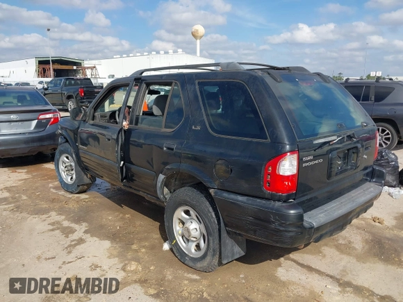2001 Isuzu Rodeo S with VIN 4S2CK58W114363340, listed as a IAAI auction lot 41498698 with 185,408 mi miles and . Bid and sale history available at DreamBid. Image 3.