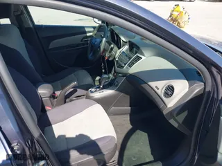 2013 Chevrolet Cruze LS with VIN 1G1PA5SG8D7298080, listed as a IAAI auction lot 42004205 with 127,834 mi miles. Bid and sale history available at carsss.com. Image 5.