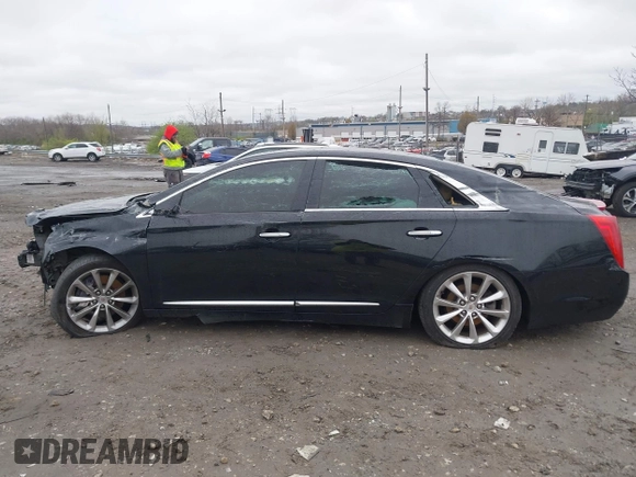 2014 Cadillac XTS Luxury with VIN 2G61M5S36E9248122, listed as a IAAI auction lot 42012167 with 188,458 mi miles and . Bid and sale history available at DreamBid. Image 13.