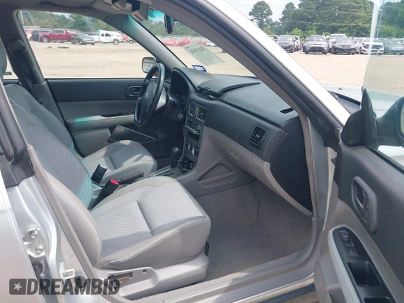 2003 Subaru Forester X with VIN JF1SG63633H743948, listed as a IAAI auction lot 39435958 with 132,774 mi miles. Bid and sale history available at carsss.com. Image 5.