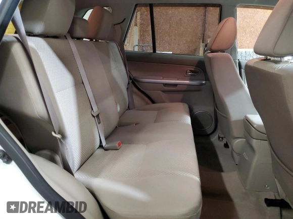 2012 Suzuki Grand Vitara Premium z VIN JS3TD0D66C4100845, wystawiony jako Copart lot #53454565 z przebiegiem 106 415 mil mil oraz Szkoda całkowita • Salvage title. Historia ofert i sprzedaży dostępna na DreamBid. Obrazek 11.
