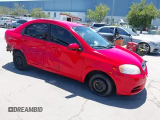 2011 Chevrolet Aveo 1LT z VIN KL1TD5DE0BB151956, wystawiony jako IAAI lot #42328720 z przebiegiem 115 765 mil mil oraz . Historia ofert i sprzedaży dostępna na DreamBid. Obrazek 1.