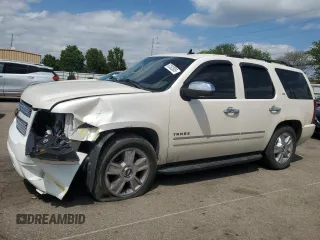 2010 Chevrolet Tahoe LTZ with VIN 1GNUKCE03AR206603, listed as a Copart auction lot 57262505 with 224,751 mi miles and Salvage title. Bid and sale history available at DreamBid. Image 1.