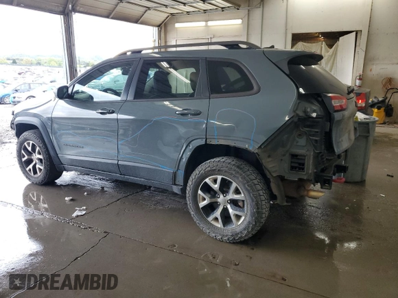 2014 Jeep Cherokee Trailhawk z VIN 1C4PJMBB0EW309277, wystawiony jako Copart lot #52370565 z przebiegiem 148 924 mil mil oraz Czysty tytuł • Clean title. Historia ofert i sprzedaży dostępna na DreamBid. Obrazek 2.
