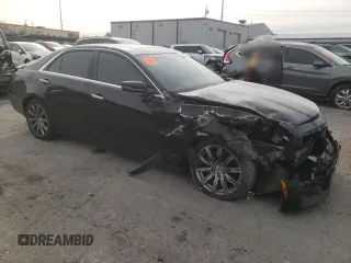 2014 Cadillac CTS Premium AWD z VIN 1G6AZ5SX7E0158072, wystawiony jako Copart lot #79503204 z przebiegiem 86 777 mil mil oraz Szkoda całkowita • Salvage title. Historia ofert i sprzedaży dostępna na DreamBid. Obrazek 4.