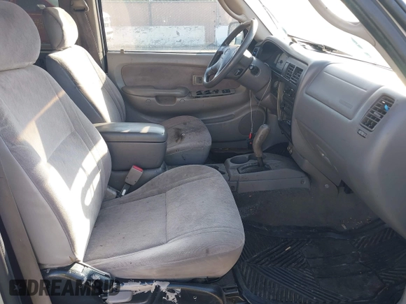 2003 Toyota Tacoma PreRunner z VIN 5TEGN92N63Z152916, wystawiony jako IAAI lot #42153765 z przebiegiem 229 221 mil mil oraz . Historia ofert i sprzedaży dostępna na DreamBid. Obrazek 5.