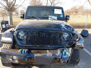 2024 Jeep Wrangler 4xe High Altitude with VIN 1C4RJXU66RW163211, listed as a IAAI auction lot 40887601 with 5,782 mi miles. Bid and sale history available at carsss.com. Image 13.