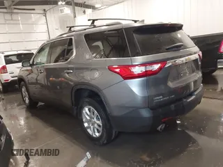 2020 Chevrolet Traverse LT with VIN 1GNEVHKW9LJ176834, listed as a IAAI auction lot 42211350 with 100,188 mi miles and . Bid and sale history available at DreamBid. Image 3.