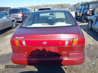 1996 Nissan Sentra XE z VIN 1N4AB41D7TC770549, wystawiony jako IAAI lot #41160561 z przebiegiem 180 485 mil mil oraz . Historia ofert i sprzedaży dostępna na DreamBid. Obrazek 16.