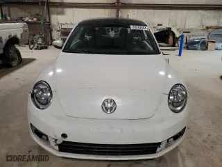 2012 Volkswagen Beetle 2.5L PZEV with VIN 3VWJP7AT3CM610930, listed as a Copart auction lot 79702664 with 0 mi miles and Salvage Title. Bid and sale history available at carsss.com. Image 5.