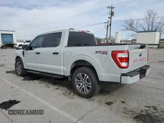 2023 Ford F-150 XL with VIN 1FTEW1CP4PKF86851, listed as a Copart auction lot 50611185 with 15,773 mi miles and Salvage Title. Bid and sale history available at DreamBid. Image 2.