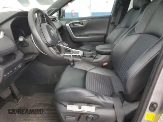 2021 Toyota RAV4 Hybrid XSE with VIN 4T3E6RFV2MU016441, listed as a Copart auction lot 57090975 with 69,304 mi miles and Salvage title. Bid and sale history available at DreamBid. Image 7.
