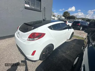 2012 Hyundai Veloster w/Gray Int with VIN KMHTC6AD6CU036826, listed as a Copart auction lot 45042645 with 169,498 mi miles and Clean title. Bid and sale history available at DreamBid. Image 4.